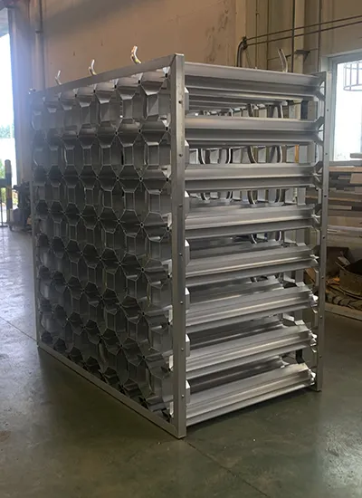 Ambient air vaporizers are constructed with aluminum finned tubes