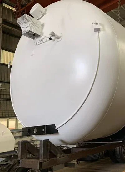 lng-storage-tank-production Large industrial LNG storage tank under construction in a factory setting
